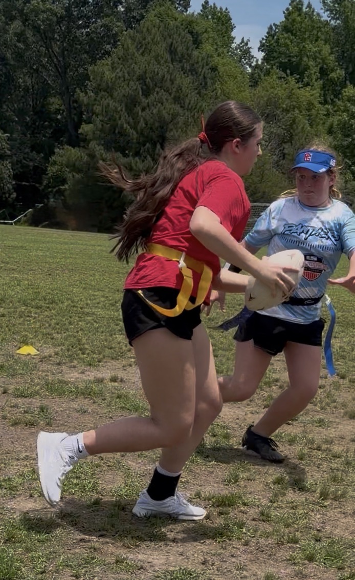 Avery running with the ball